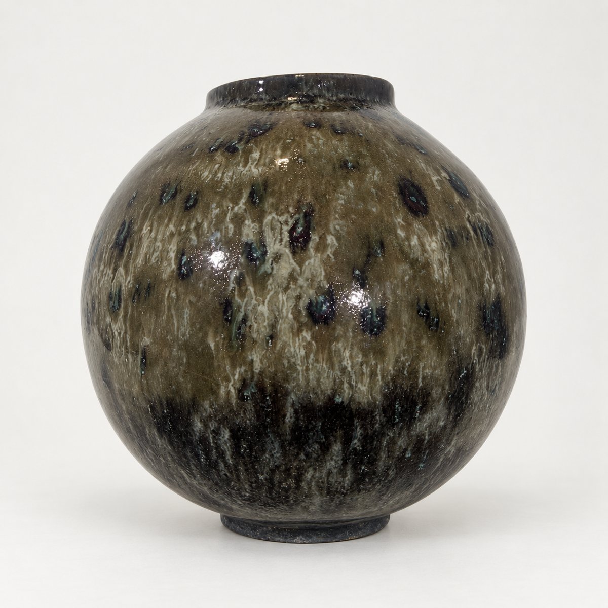 Moon jar, olive-grey glaze with white lacing and dark blue-green spots over a black base